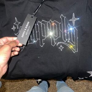 Black Graphic Tee with Rhinestone Design